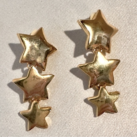 Vintage 80s Bold Gold tone Star Drop Dangle Clip Earrings